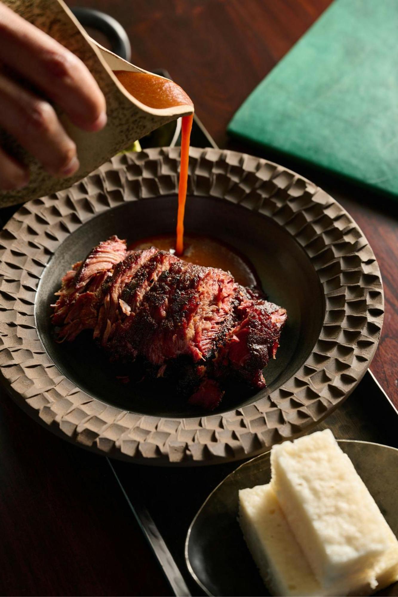 The Dubai Edition Екстериор снимка A plate of grilled meat